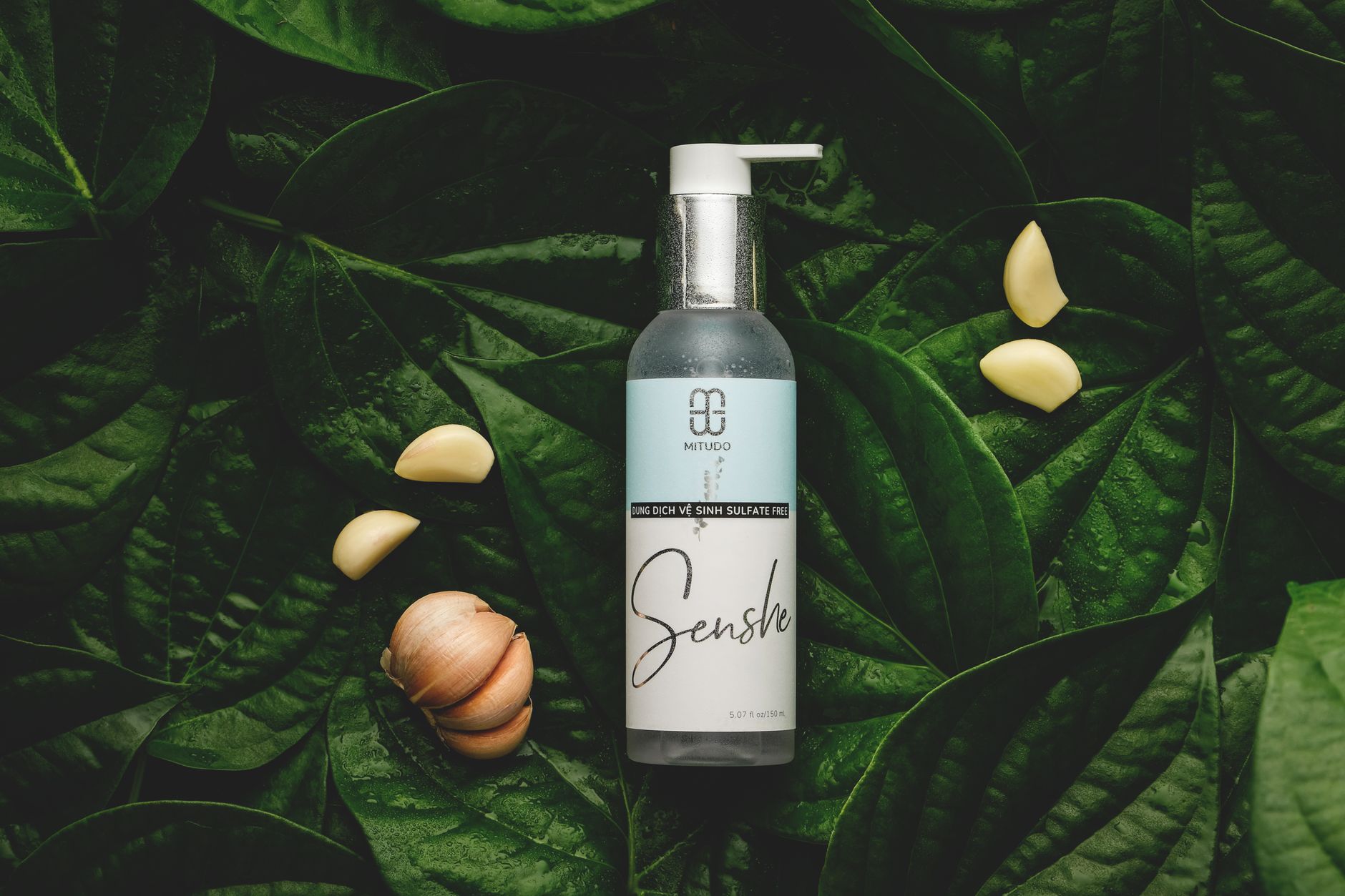 A person gently washing their face with a cleanser