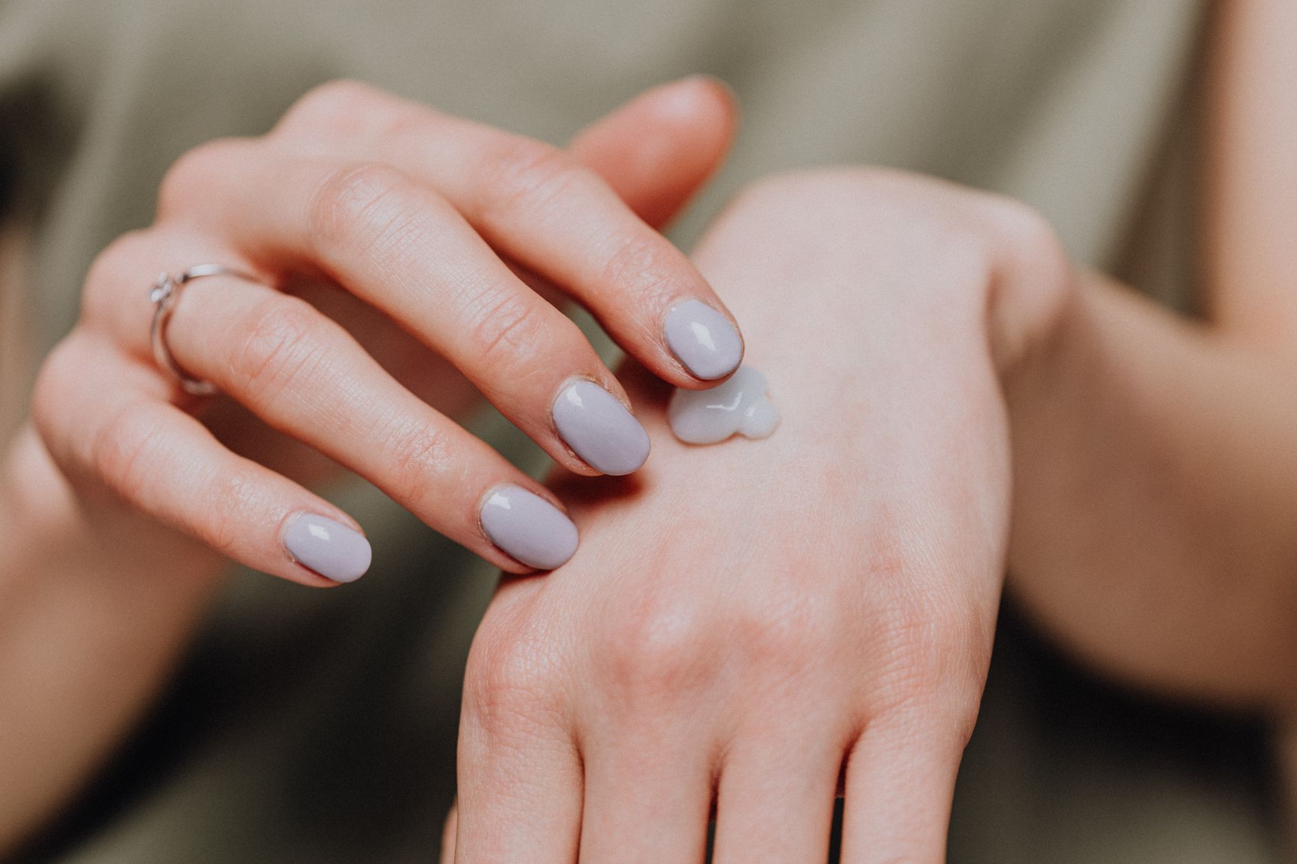 A close-up of dewy skin with a subtle sheen, suggesting healthy hydration.